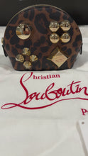 Load and play video in Gallery viewer, Christian Louboutin Leopard Leather Zip Cosmetic Clutch