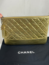 Load image into Gallery viewer, Chanel Gold Gabrielle Medium O case Clutch