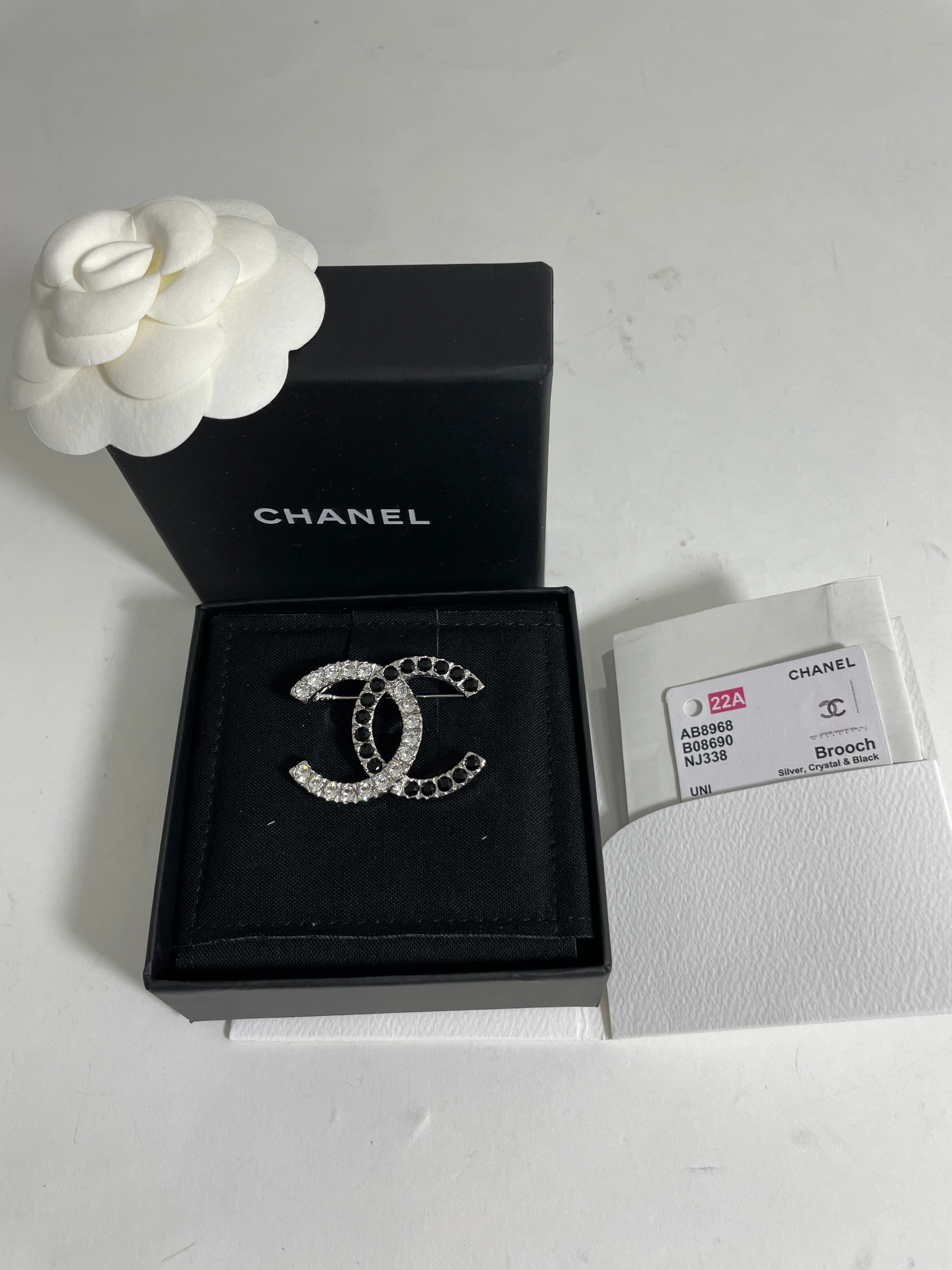 Chanel 22A Silver Black/White Crystal Brooch – The Millionaires Closet