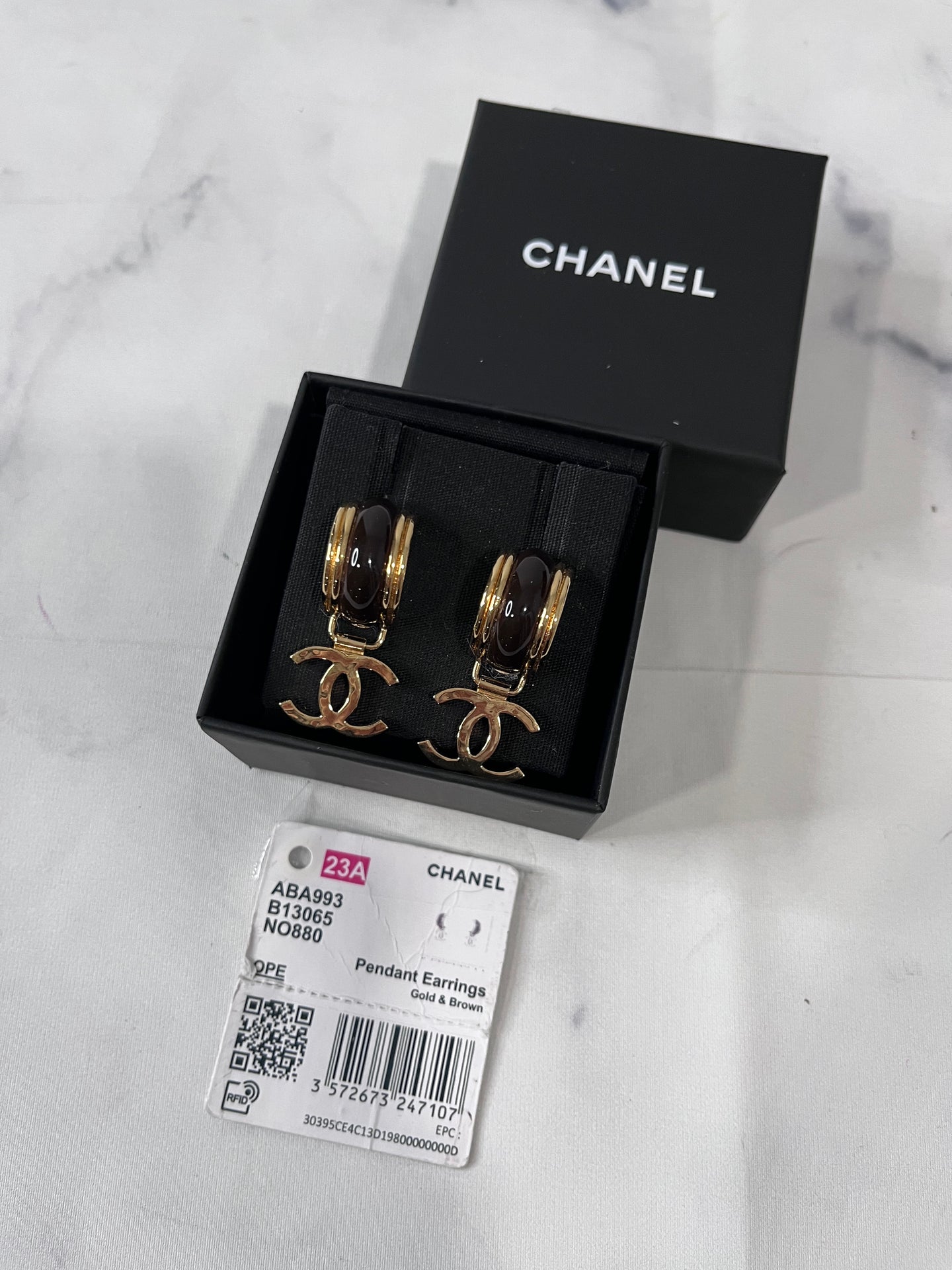 Chanel 23A Gold Tone CC Pendant Earrings