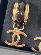 Load image into Gallery viewer, Chanel 23A Gold Tone CC Pendant Earrings
