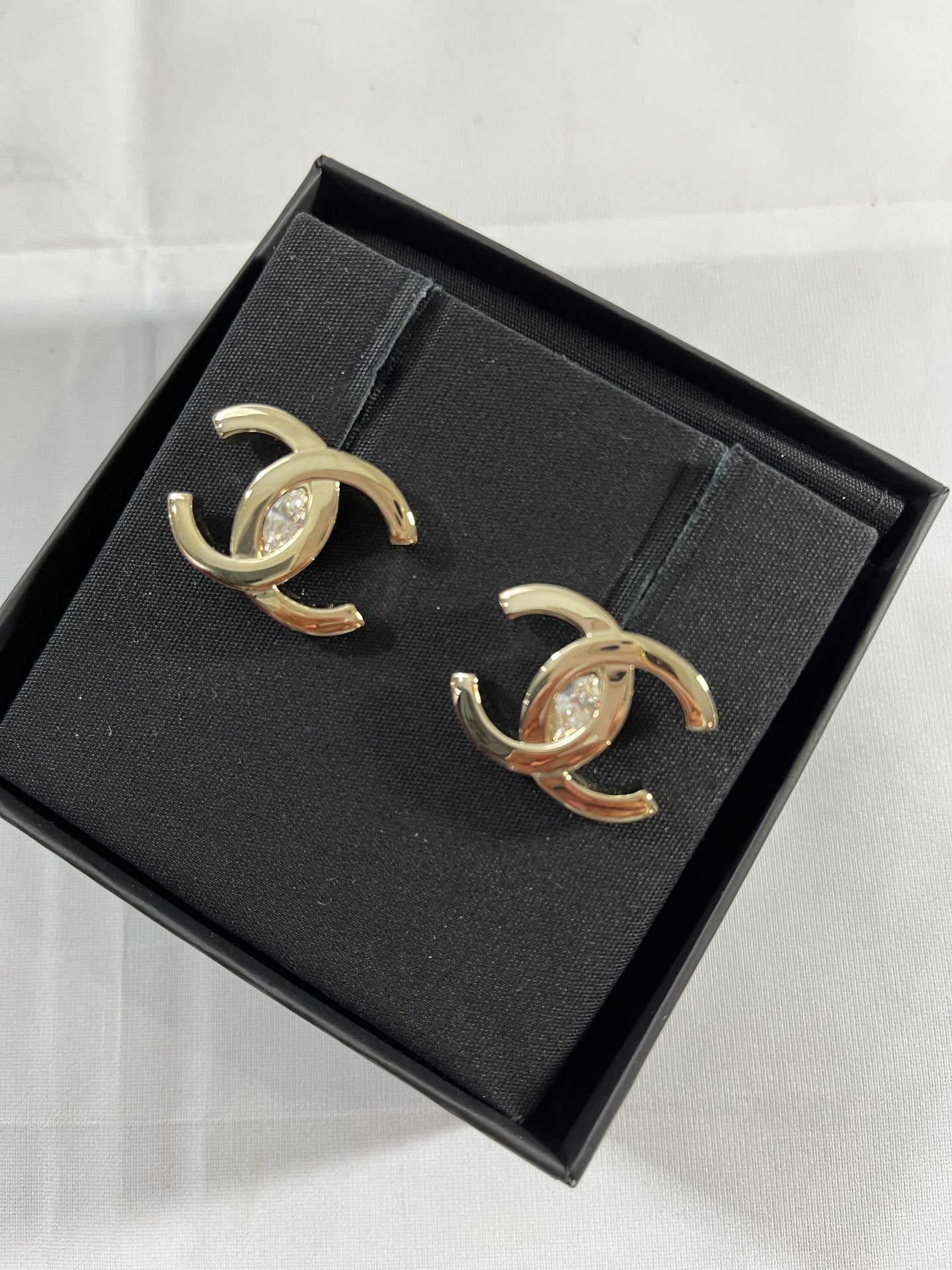 Chanel CC Large Gold Tone Uncut Crystal Earrings
