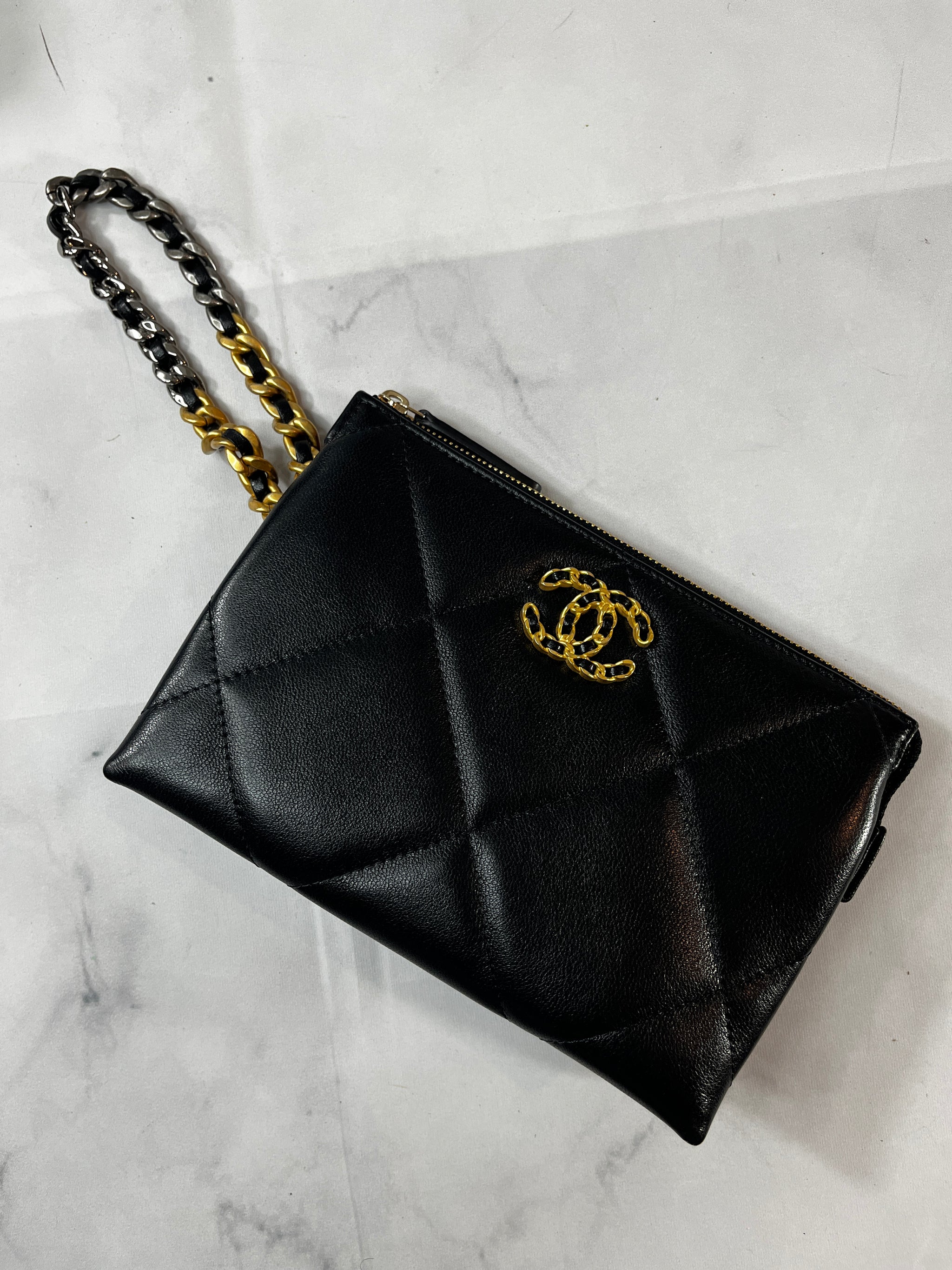 Chanel 19 Black Quilted Wristlet Clutch Bag – The Millionaires Closet