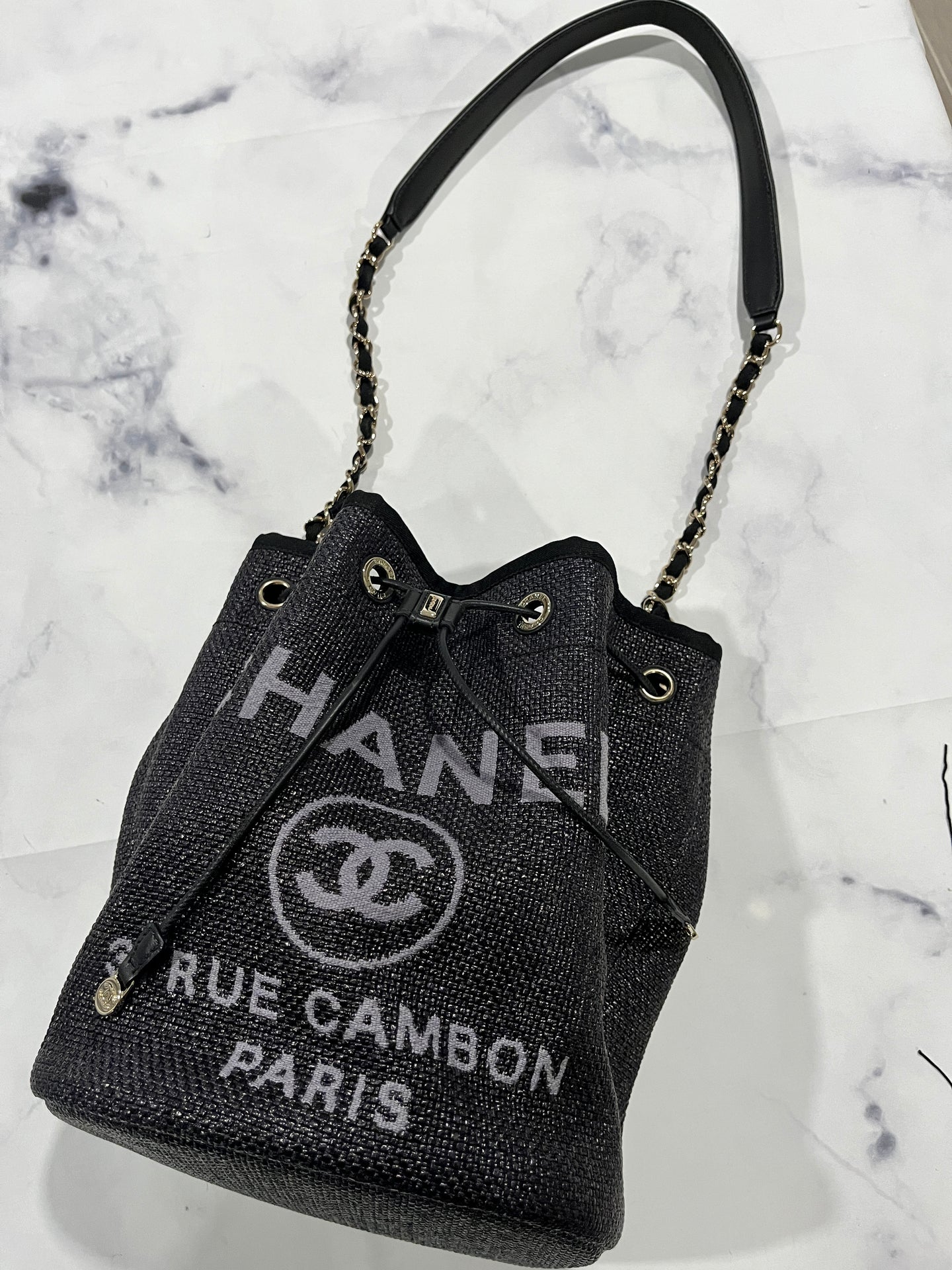 Chanel 19C Black Raffia Drawstring Bucket Bag