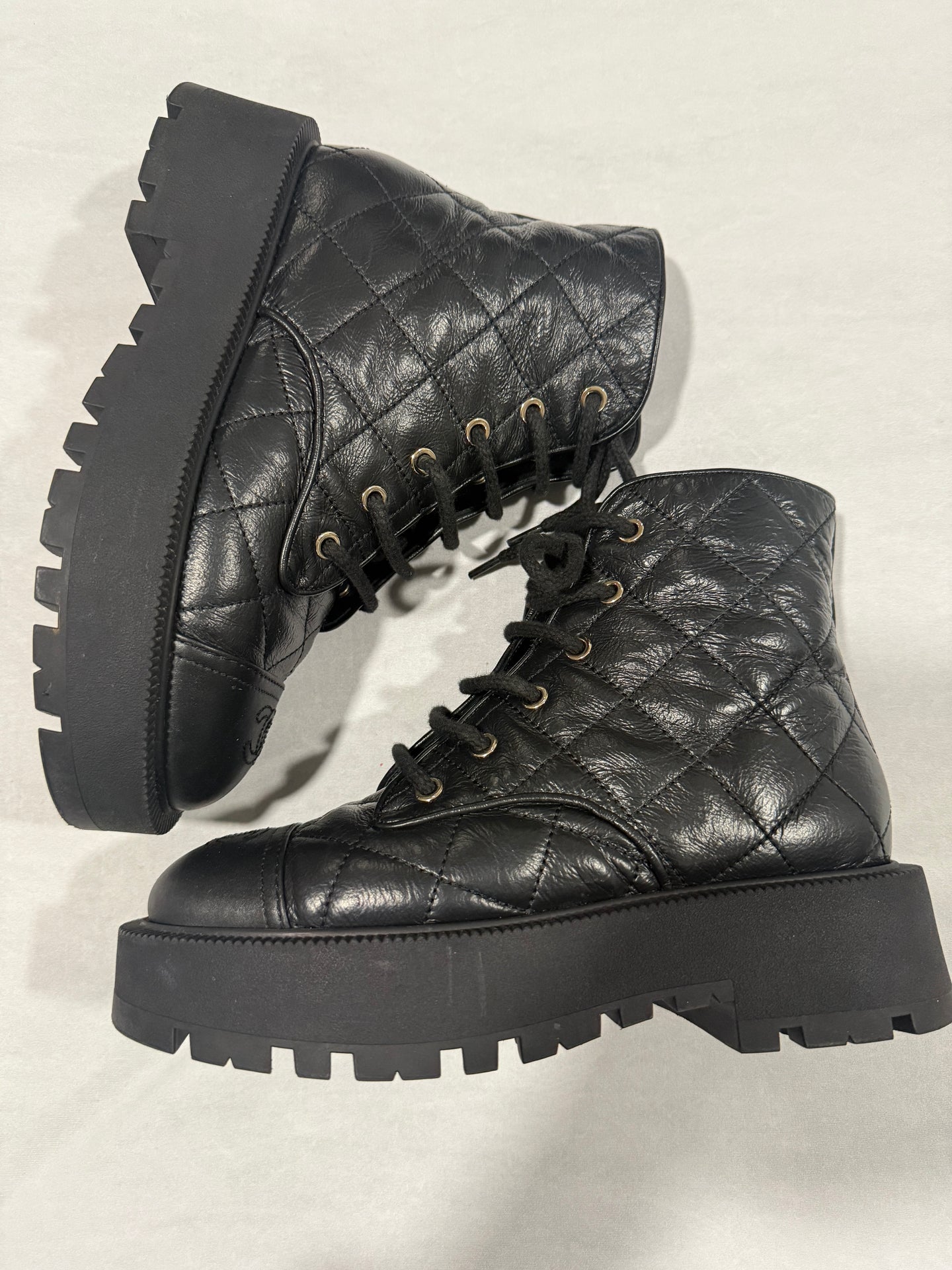 Chanel 24 Black Leather Quilted Laceup Booties