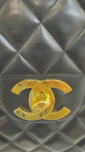 Load and play video in Gallery viewer, Chanel Vintage Black Lambskin Maxi
