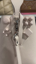 Load and play video in Gallery viewer, Christian Louboutin Leche Cabachic Leather Bucket Bag
