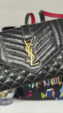 Load and play video in Gallery viewer, Saint Laurent YSL Cassandre Black Quilted Snap Wallet
