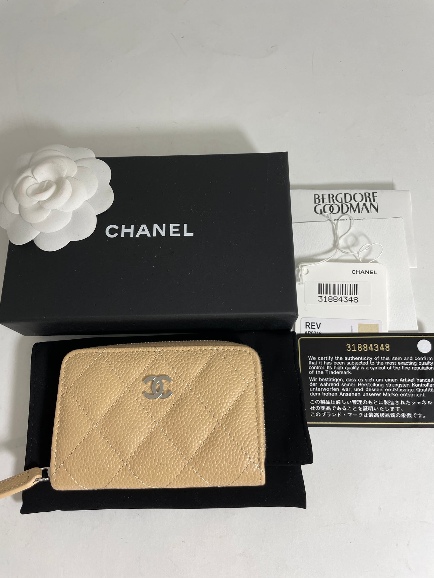 Chanel Beige Quilted Caviar Zip Wallet