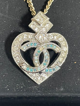 Load image into Gallery viewer, Chanel CC Clear Blue Crystals Goldtone Silvertone Heart Necklace
