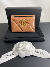 Load image into Gallery viewer, Chanel caramel lambskin quilted card case w/gold hardware

