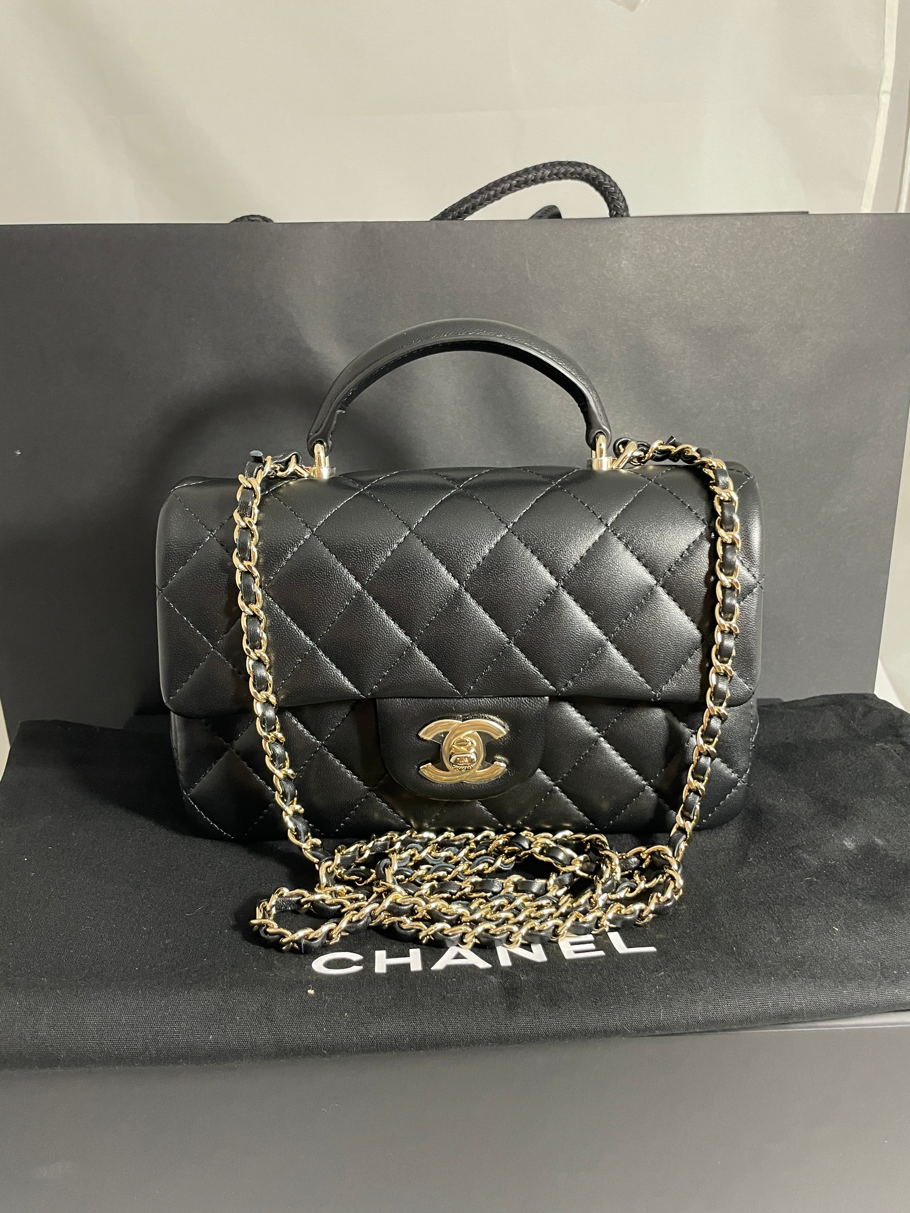 Chanel Classic Black Mini Rectangle Top Handle Handbag – The Millionaires  Closet