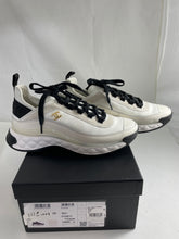 Load image into Gallery viewer, Chanel Ivory With Black Accent Calfskin Trainer Sneakers
