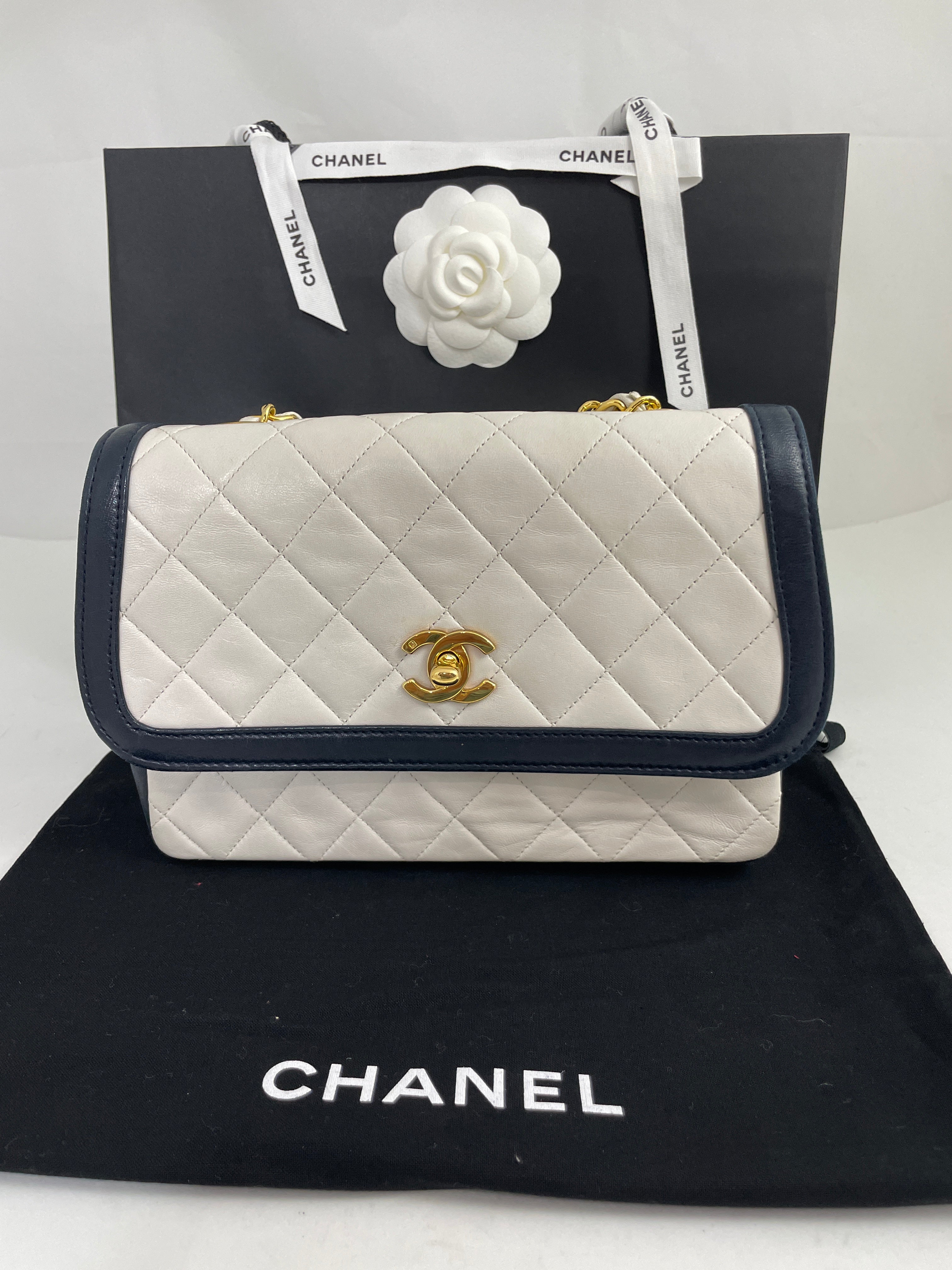 Chanel Vintage 1990s Lambskin Single Flap White/Navy Handbag – The  Millionaires Closet