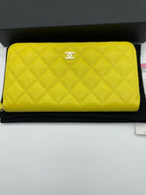 Load image into Gallery viewer, Chanel Yellow Zippy Long Caviar Wallet

