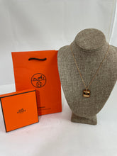 Load image into Gallery viewer, Hermes Rose Gold Plated Necklace With Swift Leather Pendant
