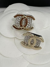 Load image into Gallery viewer, Chanel Gold Tone CC With Silver Pave Crystal Stud Earrings
